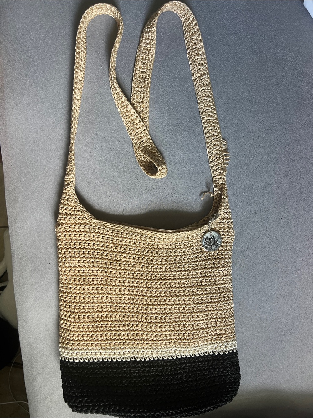 The Sak Handmade Crochet Two-Tone Crossbody Bag in Beige and Black
